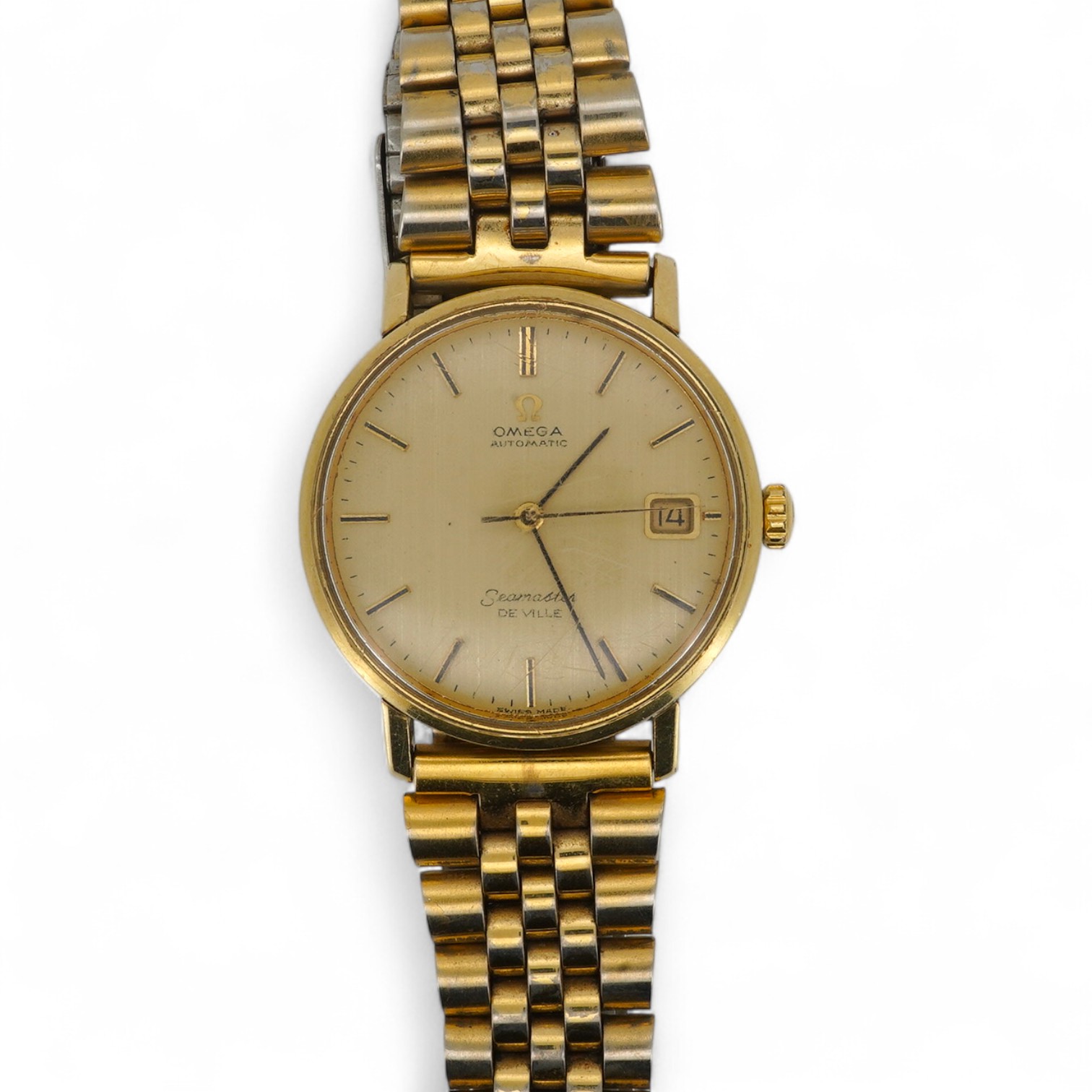 A gentleman's 1960's? steel and gold plated Omega Seamaster De Ville Automatic wrist watch, with baton numerals and date aperture, case diameter 35mm, on an associated gold plated steel bracelet(worn), no box or papers.